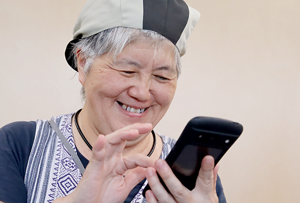 アプリを使用している登録スタッフMさん