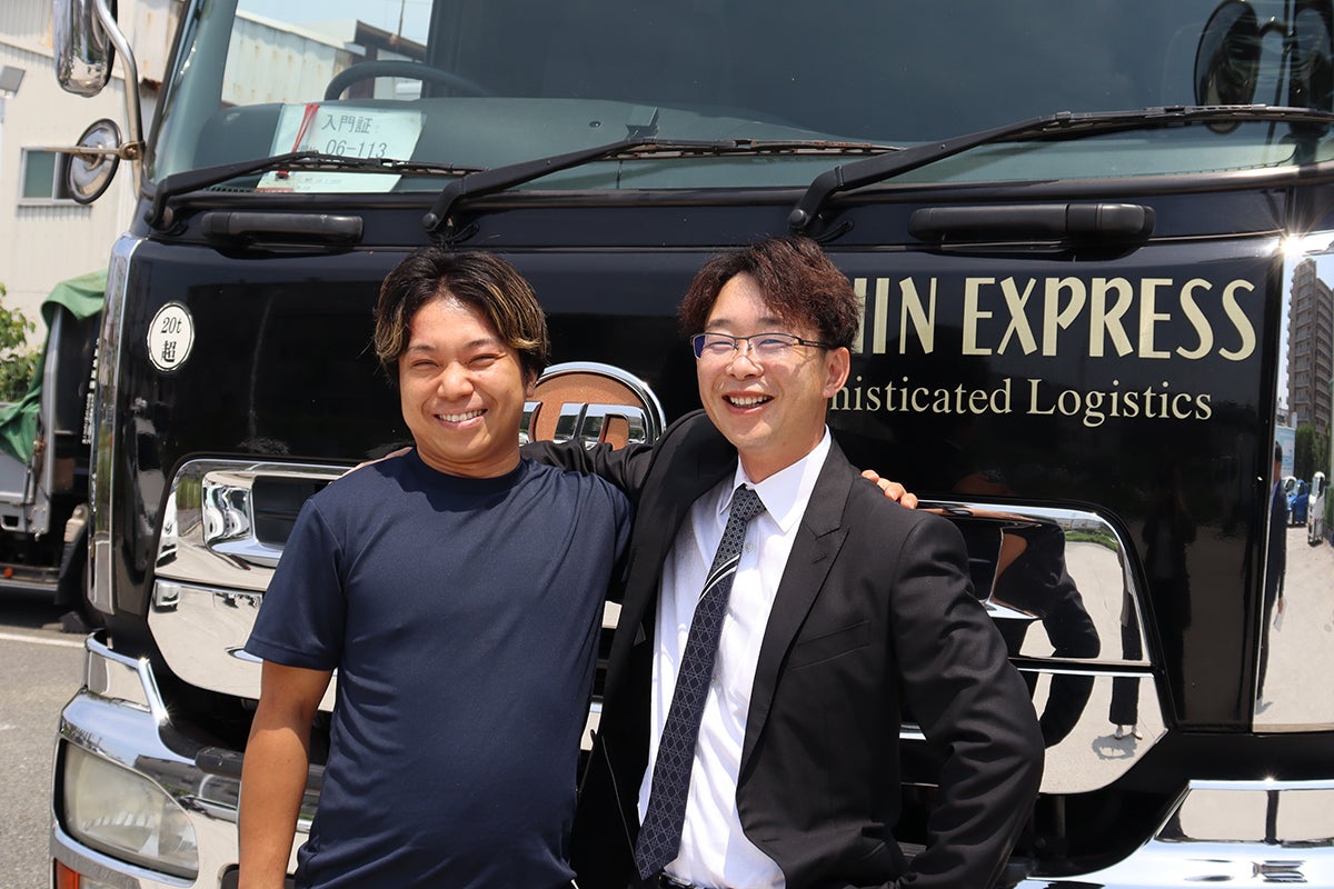 「この黒いトラックがカッコイイんです」と語るHさん